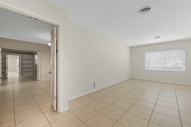 view of tiled spare room