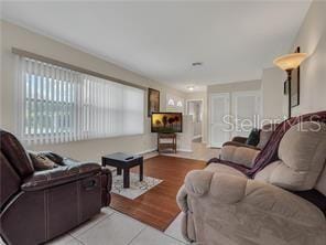 living room with hardwood / wood-style floors