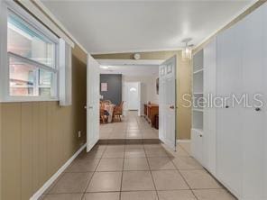 hallway with light tile patterned flooring