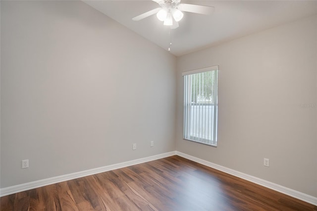 empty room with hardwood / wood-style floors and ceiling fan