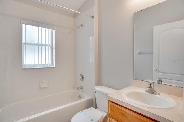 full bathroom featuring vanity, toilet, and  shower combination