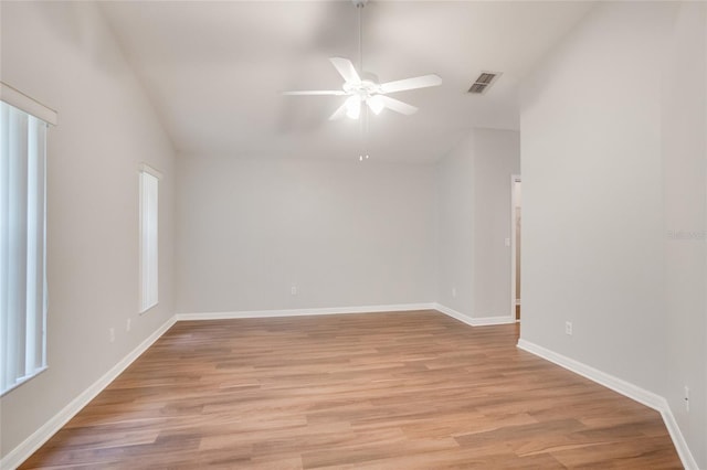 unfurnished room with ceiling fan and light hardwood / wood-style floors