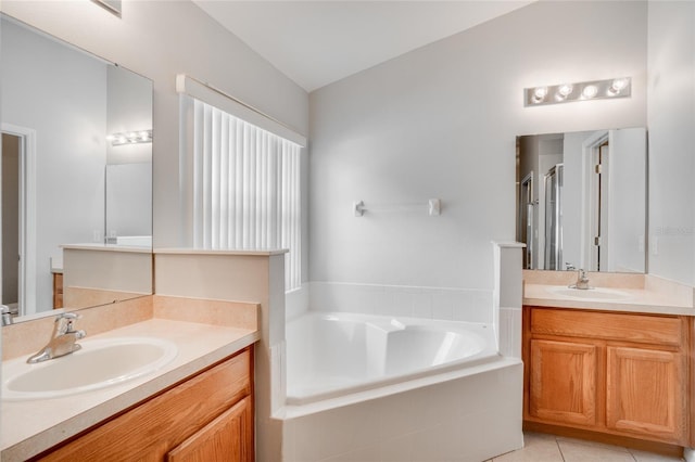 bathroom featuring vanity, plus walk in shower, and tile patterned flooring