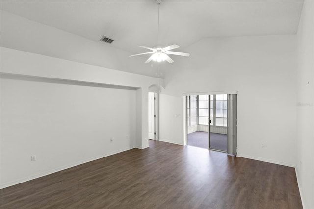 spare room with ceiling fan, dark hardwood / wood-style flooring, and vaulted ceiling