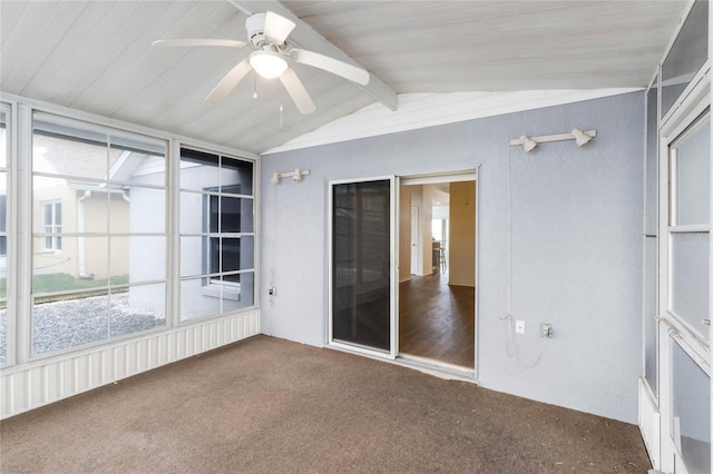 unfurnished sunroom with vaulted ceiling with beams and ceiling fan