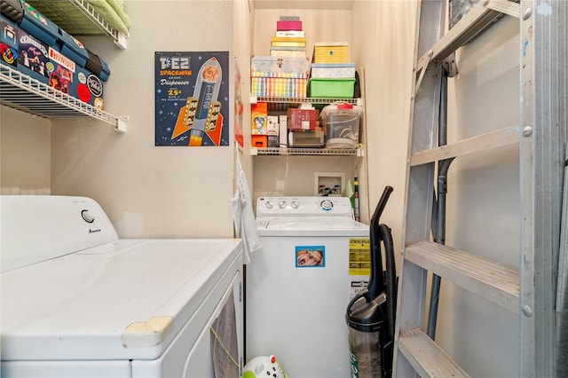 laundry area with washing machine and dryer