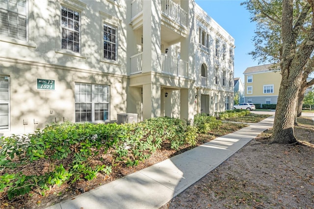 view of building exterior featuring central AC unit