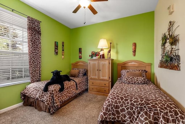 bedroom featuring carpet flooring and ceiling fan