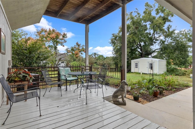 wooden deck featuring an outdoor structure