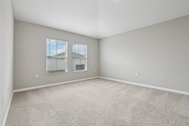 empty room featuring carpet flooring