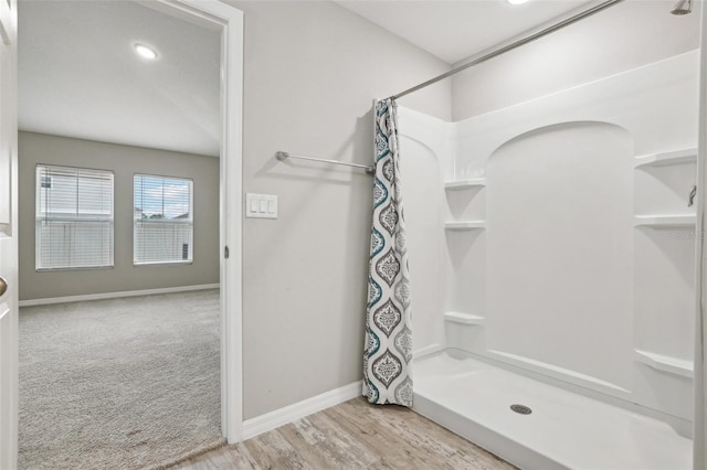 bathroom with a shower with curtain