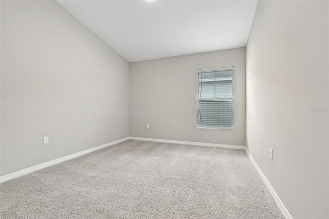 unfurnished room with carpet flooring