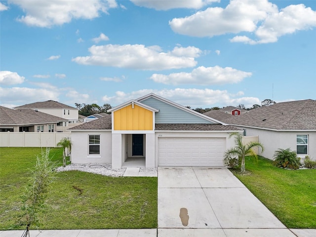 single story home featuring a front lawn and a garage