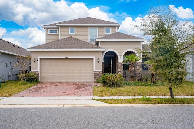 view of front of house with a garage