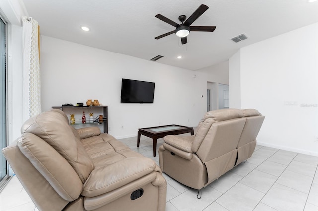 living room with light tile patterned floors and ceiling fan