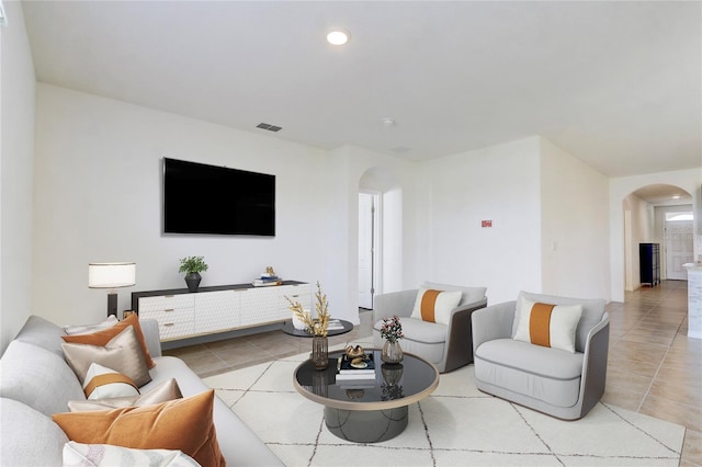 living room featuring light tile patterned floors