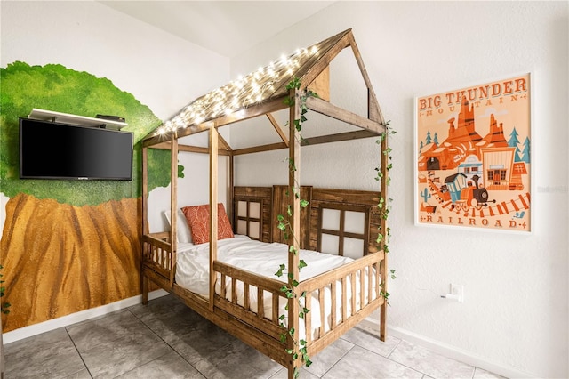 bedroom with tile patterned floors