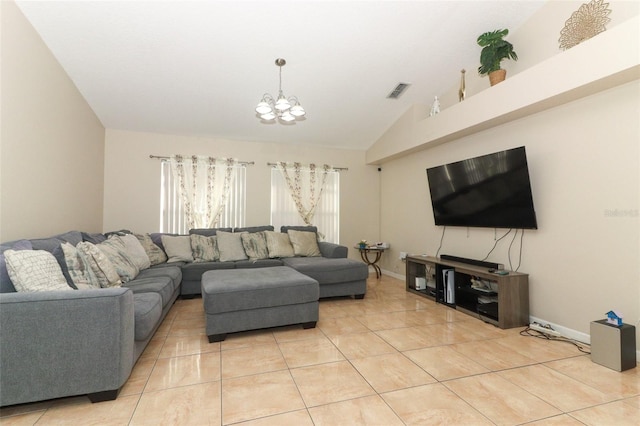 living room with vaulted ceiling, a notable chandelier, and light tile patterned flooring