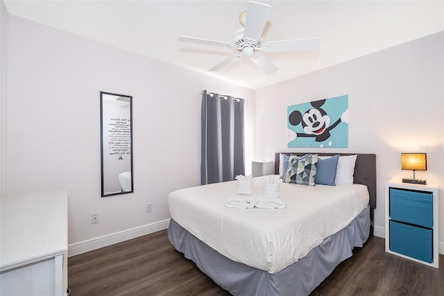 bedroom with ceiling fan and dark hardwood / wood-style floors