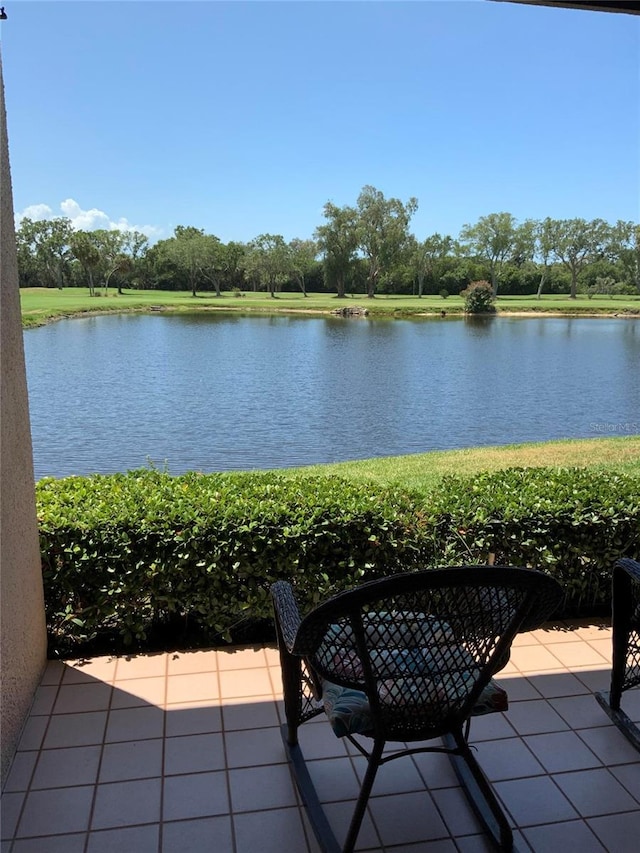 view of patio / terrace with a water view