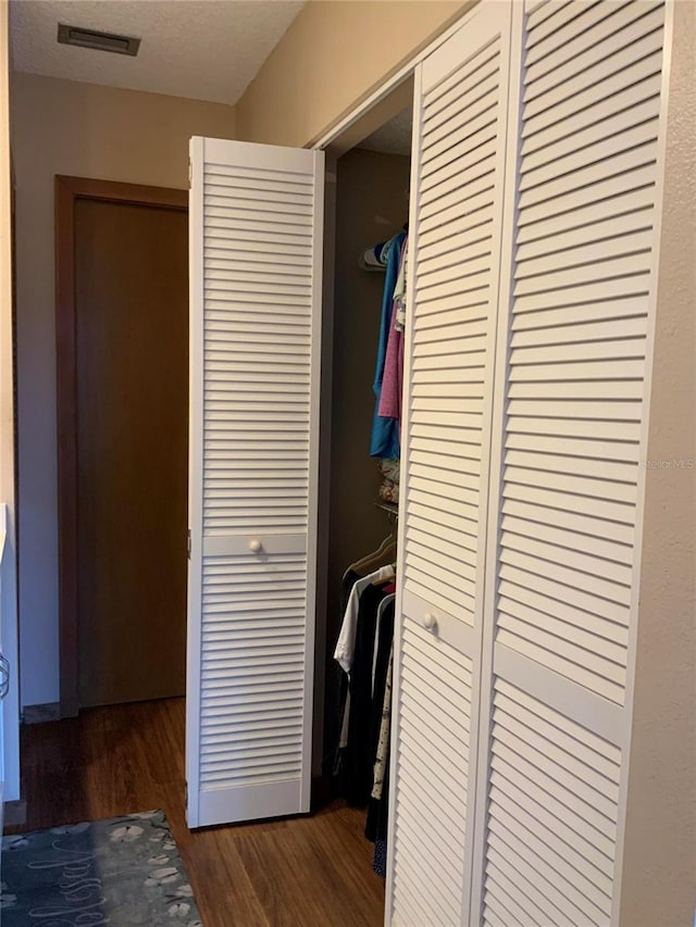 closet featuring visible vents