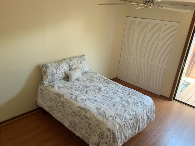 bedroom featuring a closet, ceiling fan, and wood finished floors