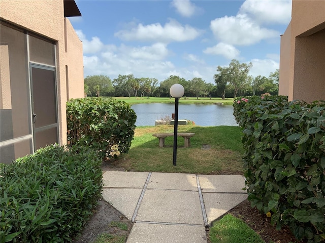 view of patio featuring a water view