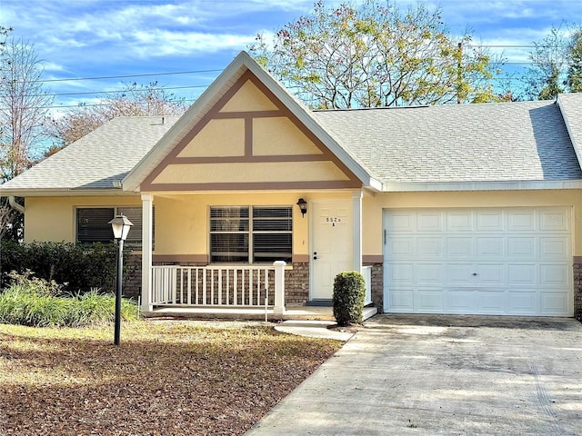 view of front of house with a garage and covered porch