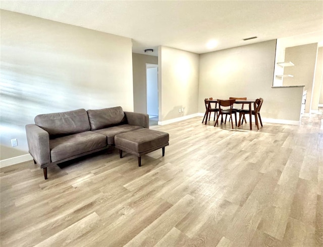 living room featuring light hardwood / wood-style floors