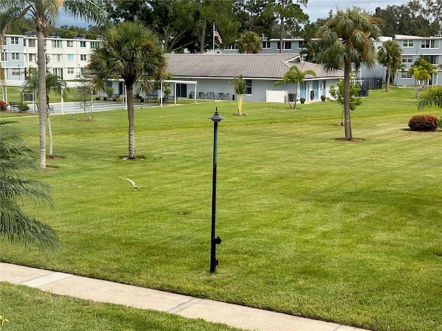 view of community with a lawn