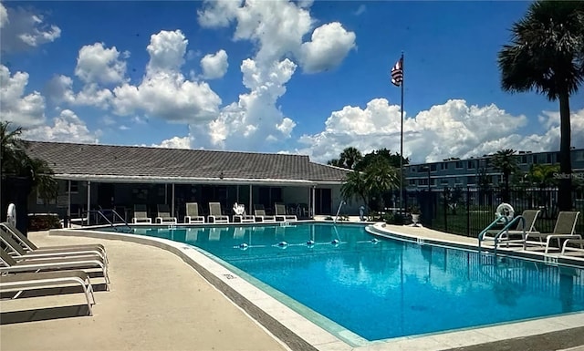 view of swimming pool with a patio