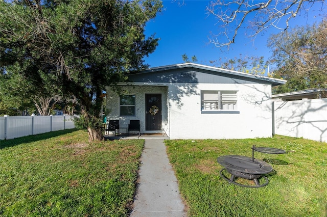 bungalow with a front yard