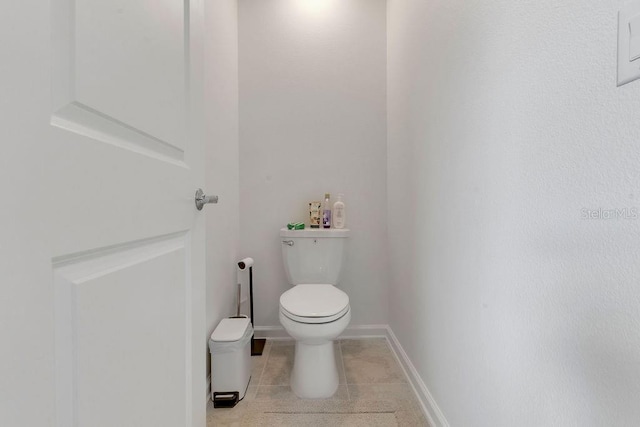 bathroom featuring toilet