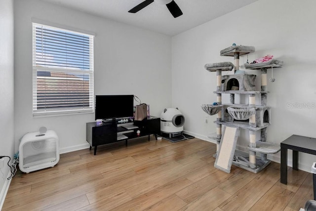 misc room featuring ceiling fan and light hardwood / wood-style floors