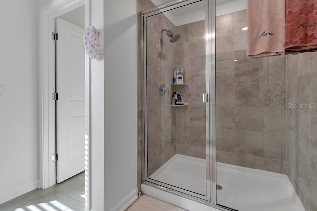 bathroom featuring tile patterned floors and walk in shower