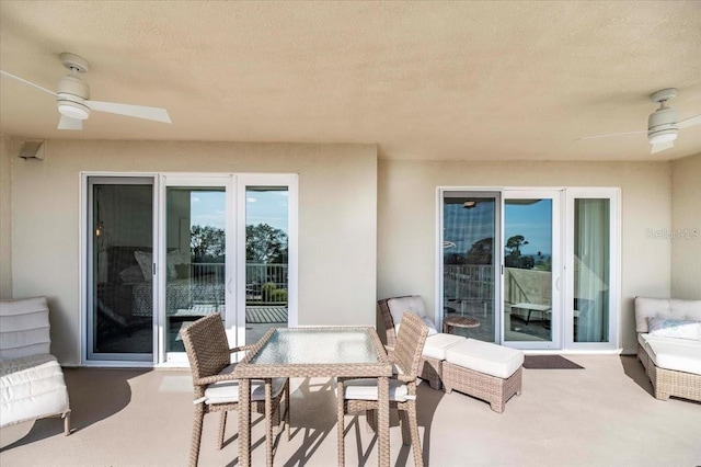 view of patio featuring ceiling fan