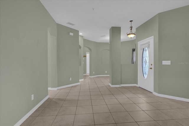 foyer featuring light tile patterned flooring