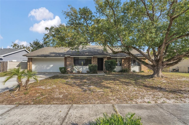 single story home featuring a garage