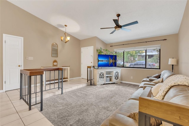 tiled living room featuring vaulted ceiling and ceiling fan