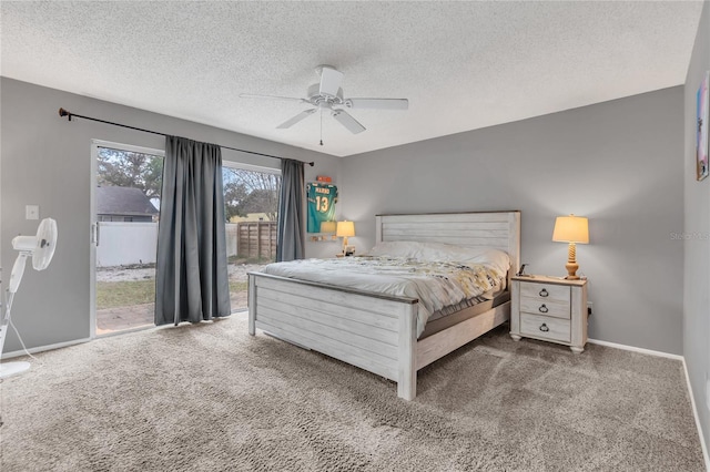 bedroom with access to exterior, a textured ceiling, carpet floors, and ceiling fan