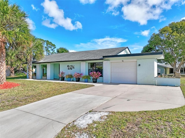 ranch-style house with a garage and a front yard