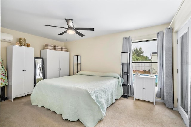 carpeted bedroom featuring a wall mounted AC and ceiling fan