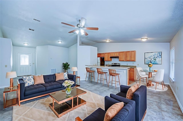 637 Twin Lake Ave, Deltona, FL 32738 - living area with vaulted ceiling and ceiling fan