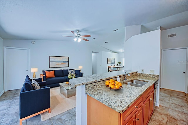 637 Twin Lake Ave, Deltona, FL 32738 - kitchen featuring light stone countertops, ceiling fan, vaulted ceiling, open floor plan, and stainless steel dishwasher