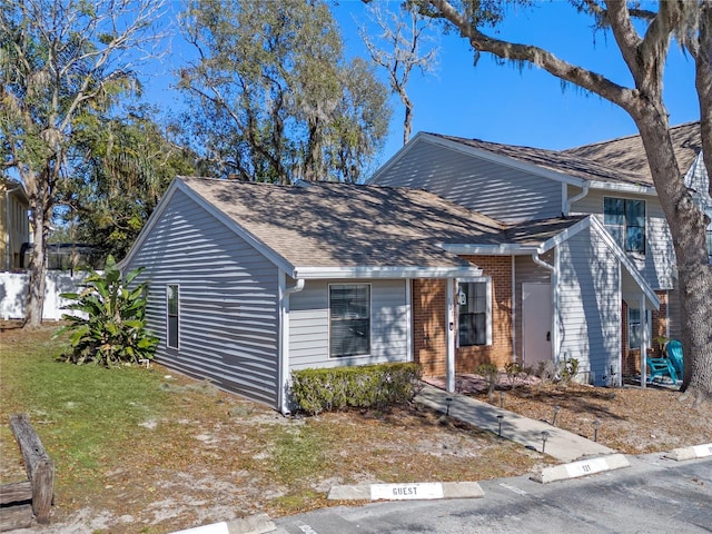 view of front of home with a front lawn