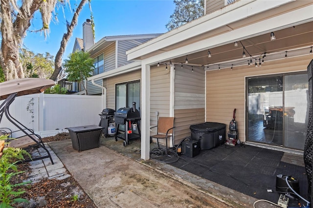 view of patio with a grill