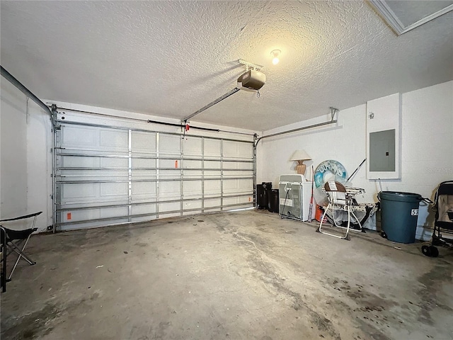 garage with electric panel and a garage door opener