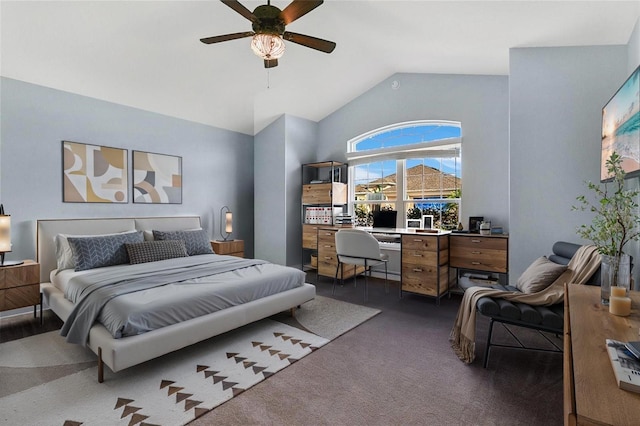 bedroom featuring lofted ceiling, ceiling fan, and dark colored carpet