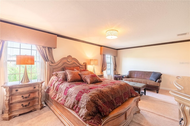 bedroom with light colored carpet and crown molding