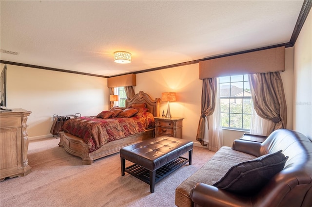 bedroom featuring a textured ceiling, light colored carpet, and crown molding